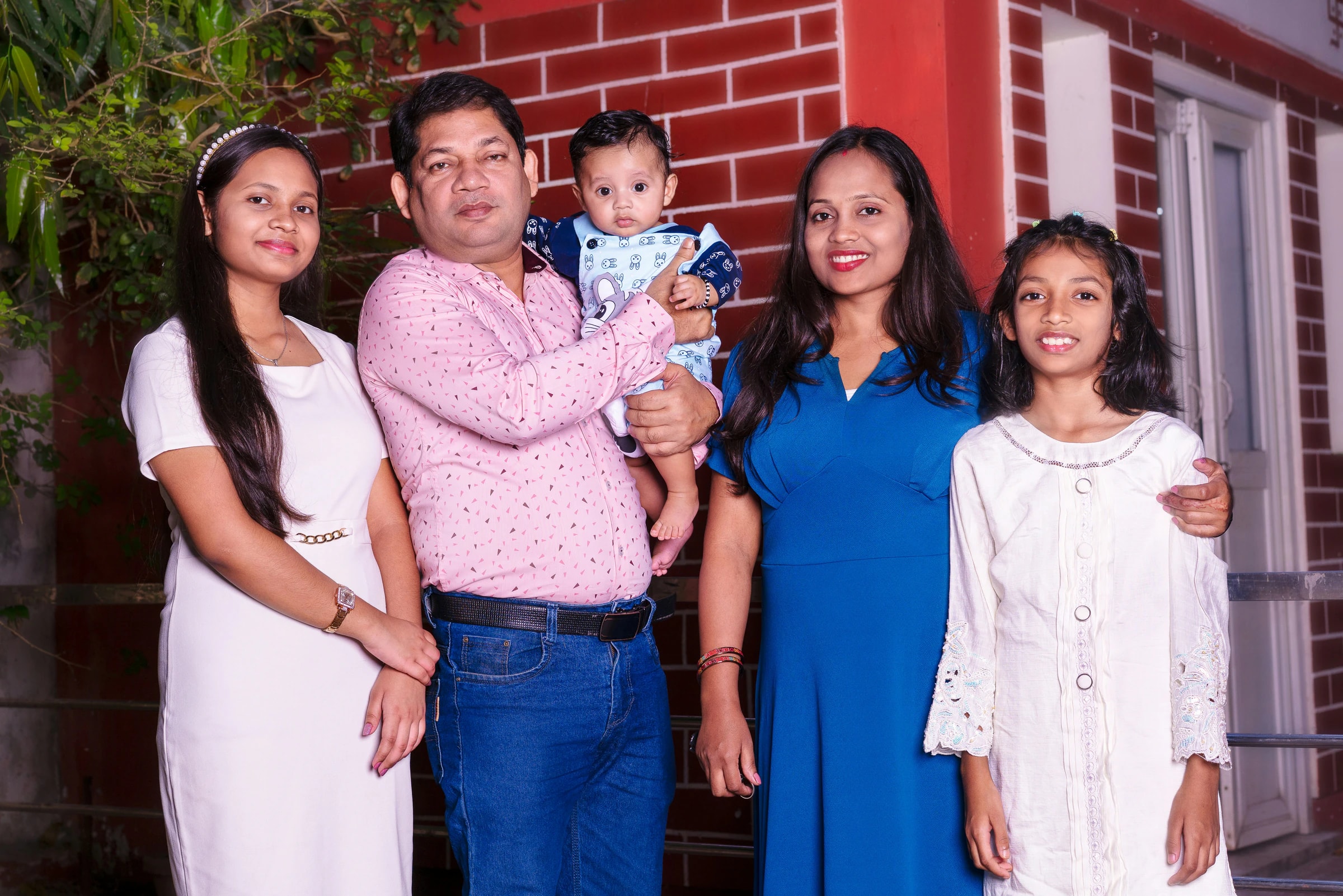 Family posing together for a portrait