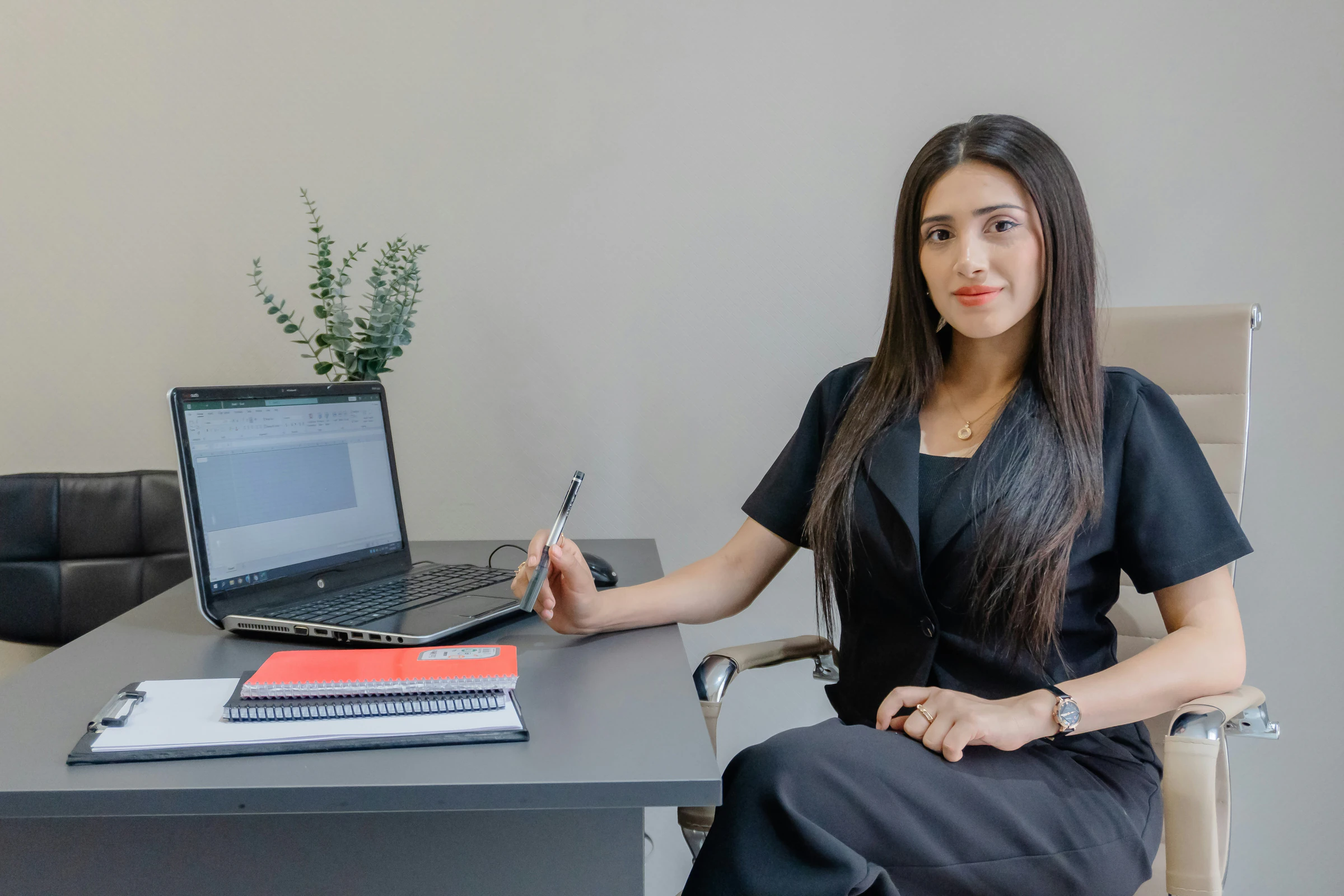 Young professional working at her desk